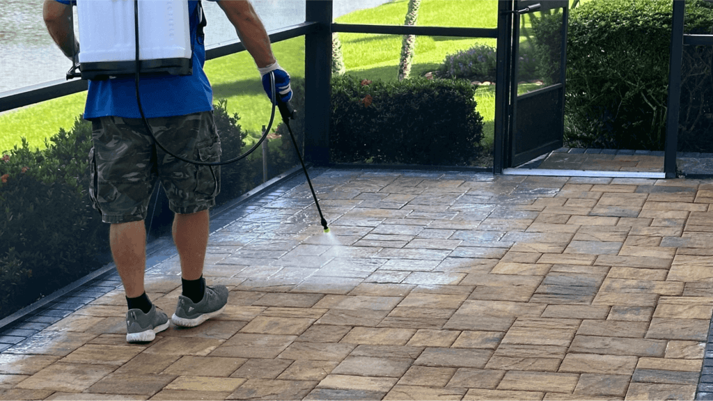 Pressure Washing in Eagle Lake, FL. Professional paver sealing in progress, ensuring durable and vibrant surfaces.